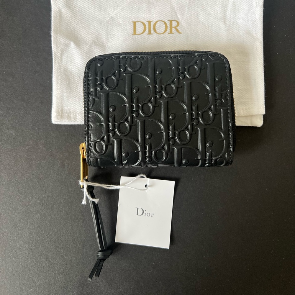 Black Dior monogram leather embossed zip around card case wallet - $700